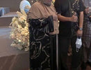 Parent wearing abaya